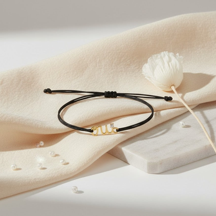 سوار Oui بخيط وذهب عيار 18