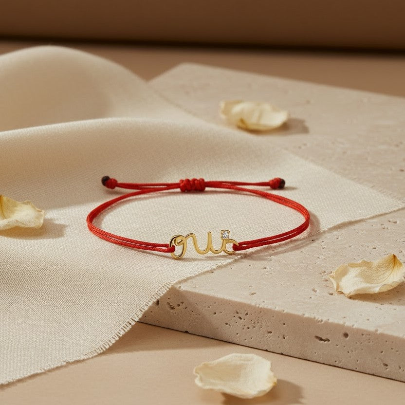 سوار Oui بخيط وذهب عيار 18